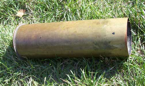 [a copper WWII tank shell casing]