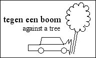 [a car smashed against a tree]