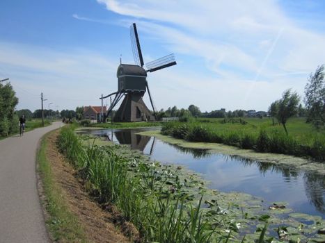 [windmill, canal, bike path]