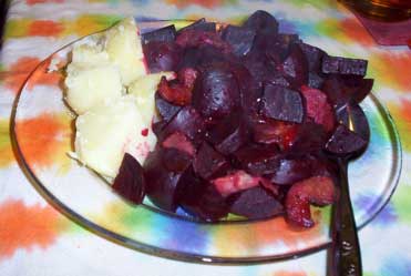 [cooked beets on plate with potatoes and
  boiled egg]