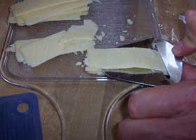 [slicing cheese]