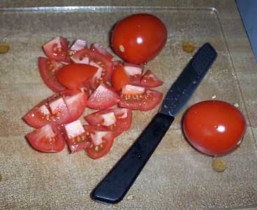 [cutting tomatoes]