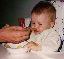 [a small child rejecting Belgian Endives, horrified]