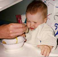 [a small child rejecting Belgian Endives, horrified]