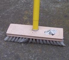 [a push broom]