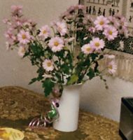 [vase with cut flowers]