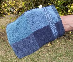 [a washcloth - actually a rectangular terrycloth mitt]